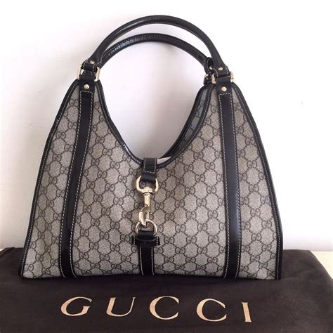 gucci purse hobo monogram gold|Gucci signature hobo bag.